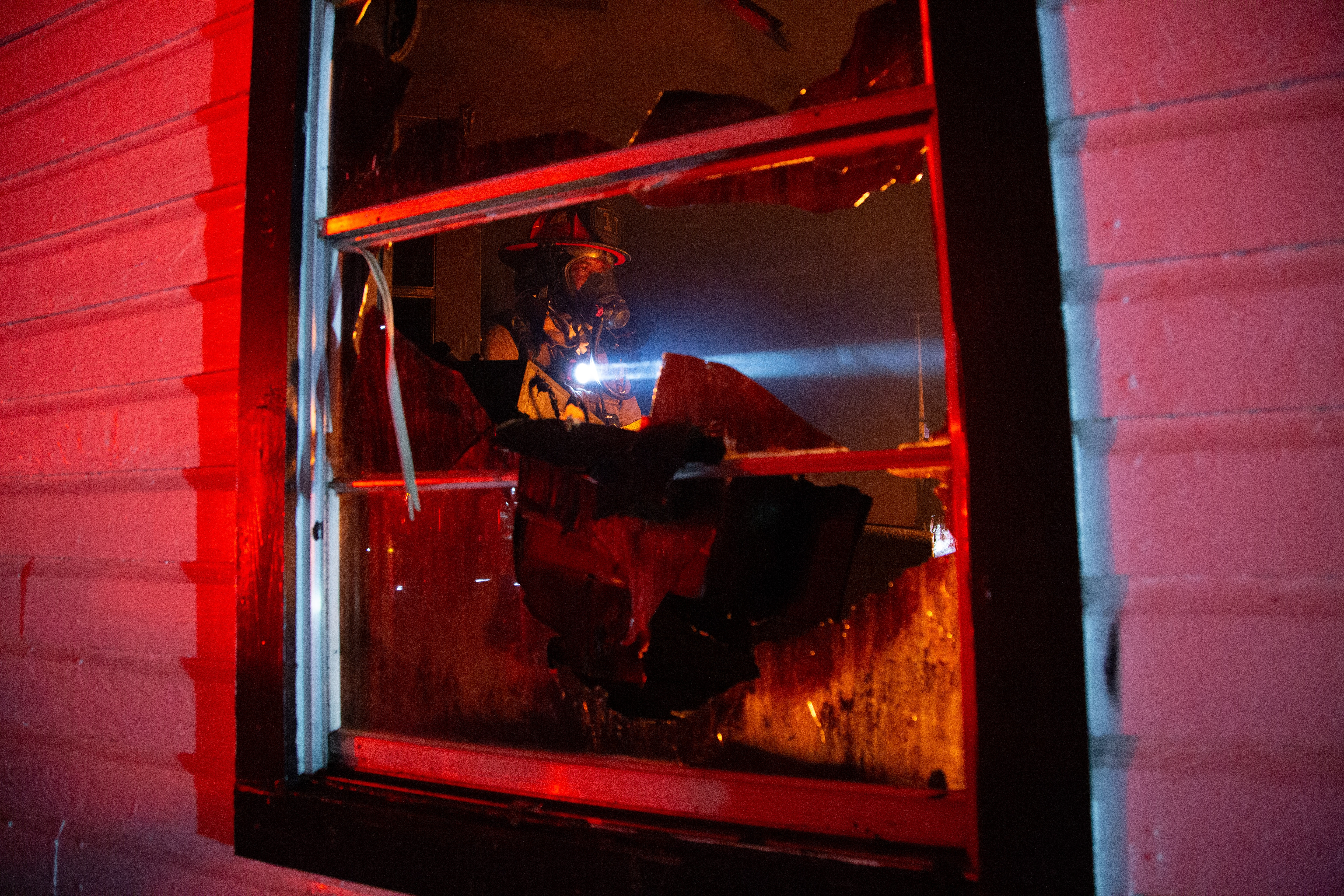 Firefighter working at house fire