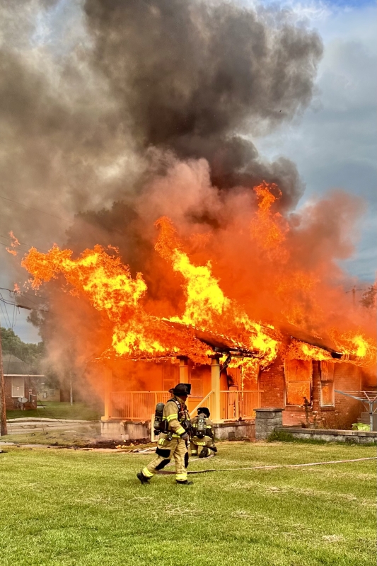 Firefighters working at residential fire