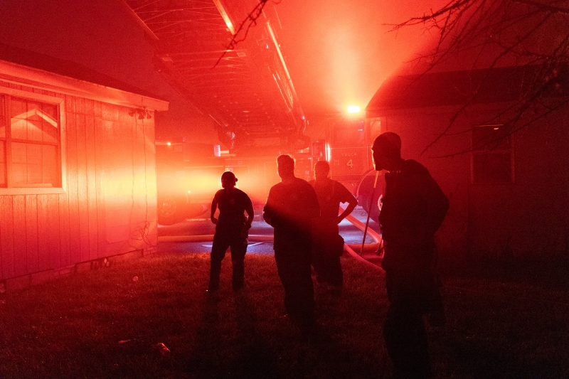 Firefighters working at night